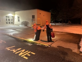 Winter Works crew maintaining commercial property grounds